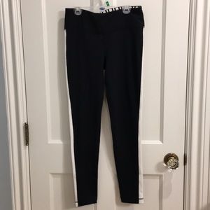 black leggings with white stripe down the side